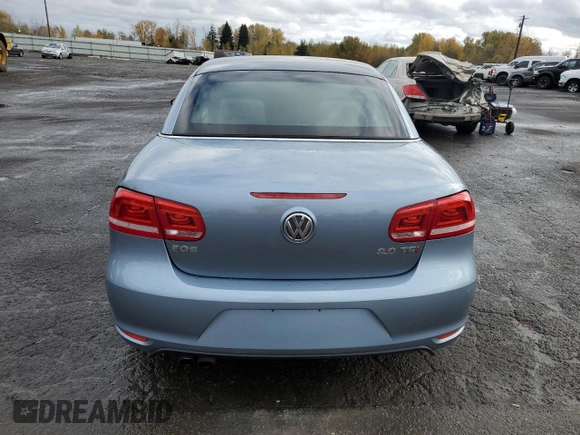 2013 Volkswagen Eos Komfort with VIN WVWBW8AH9DV007077, listed as a Copart auction lot 80254434 with 87,620 mi miles and Salvage Title. Bid and sale history available at DreamBid. Image 6.