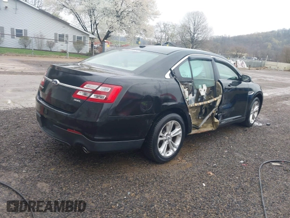 2013 Ford Taurus SEL with VIN 1FAHP2E83DG107913, listed as a IAAI auction lot 42007575 with 147,240 mi miles. Bid and sale history available at carsss.com. Image 4.