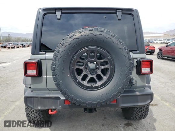 2023 Jeep Wrangler Rubicon with VIN 1C4JJXFG4PW523432, listed as a Copart auction lot 51642975 with 23,631 mi miles and Salvage title. Bid and sale history available at DreamBid. Image 6.