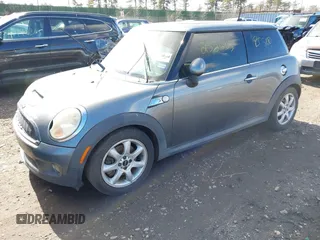 2007 MINI Hardtop S with VIN WMWMF73527TT85146, listed as a IAAI auction lot 41502475 with Not Provided miles and . Bid and sale history available at DreamBid. Image 2.