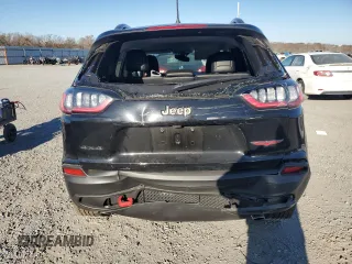 2022 Jeep Cherokee Trailhawk with VIN 1C4PJMBX5ND549237, listed as a Copart auction lot 83760264 with 24,756 mi miles and Salvage Title. Bid and sale history available at carsss.com. Image 6.