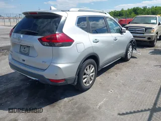2017 Nissan Rogue S with VIN 5N1AT2MTXHC880965, listed as a IAAI auction lot 42016855 with 117,672 mi miles. Bid and sale history available at carsss.com. Image 4.