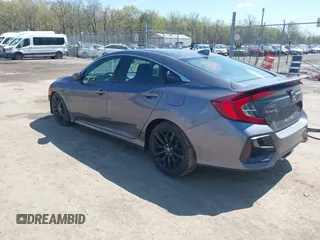 2020 Honda Civic Si z VIN 2HGFC1E53LH704576, wystawiony jako IAAI lot #41979301 z przebiegiem 59 245 mil mil oraz . Historia ofert i sprzedaży dostępna na DreamBid. Obrazek 3.
