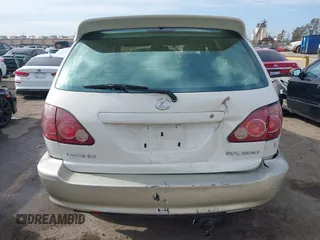 2000 Lexus RX 300 z VIN JT6HF10U8Y0098868, wystawiony jako IAAI lot #41878449 z przebiegiem 162 170 mil mil oraz . Historia ofert i sprzedaży dostępna na DreamBid. Obrazek 16.