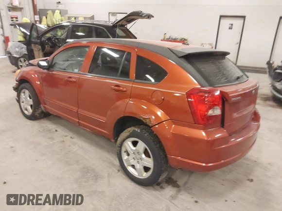 2009 Dodge Caliber SXT with VIN 1B3HB48A59D168273, listed as a IAAI auction lot 41988835 with 200,125 mi miles and . Bid and sale history available at DreamBid. Image 3.