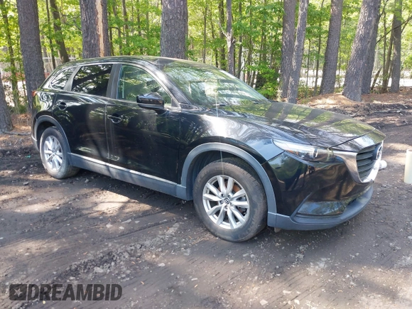 2016 Mazda CX-9 Sport with VIN JM3TCABY8G0112981, listed as a IAAI auction lot 42093389 with 106,384 mi miles. Bid and sale history available at carsss.com. Image 1.