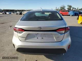 2023 Toyota Corolla LE with VIN 5YFB4MDE9PP026235, listed as a Copart auction lot 82431974 with 15,877 mi miles and Salvage Title. Bid and sale history available at carsss.com. Image 6.