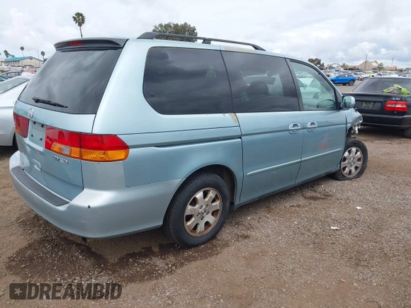 2004 Honda Odyssey EX-L with VIN 5FNRL18064B060817, listed as a IAAI auction lot 42032796 with 200,999 mi miles and . Bid and sale history available at DreamBid. Image 4.