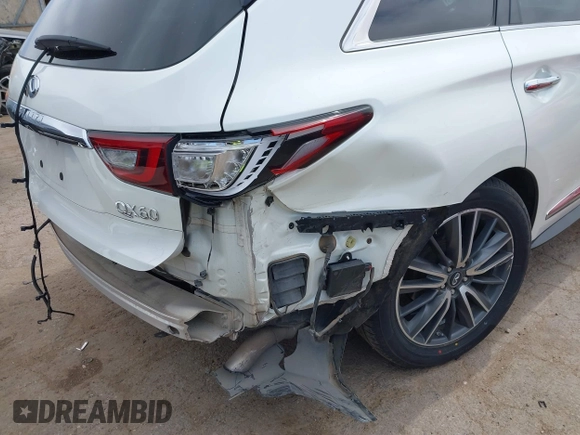 2019 Infiniti QX60 LUXE with VIN 5N1DL0MN5KC503552, listed as a IAAI auction lot 41780408 with 73,148 mi miles. Bid and sale history available at carsss.com. Image 6.