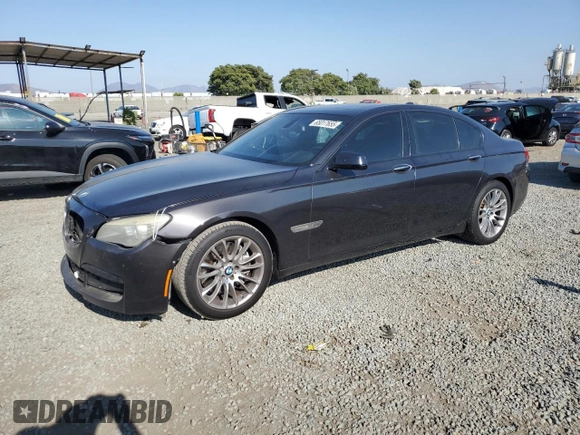 2011 BMW 7 Series 750i with VIN WBAKA8C58BCY37346, listed as a Copart auction lot 65017655 with 125,505 mi miles and Salvage title. Bid and sale history available at DreamBid. Image 1.