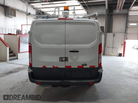 2015 Ford Transit Cargo with VIN 1FTNR1ZM2FKA55134, listed as a IAAI auction lot 42193601 with 96,231 mi miles and . Bid and sale history available at DreamBid. Image 16.