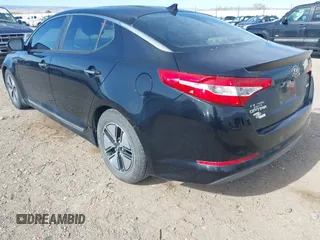 2012 Kia Optima Hybrid with VIN KNAGM4ADXC5018456, listed as a IAAI auction lot 42030994 with 1 mi miles. Bid and sale history available at carsss.com. Image 3.