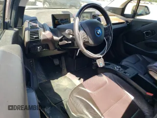 2015 BMW i3 z VIN WBY1Z4C5XFV278617, wystawiony jako Copart lot #54984645 z przebiegiem 140 868 mil mil oraz Tytuł czysty. Historia ofert i sprzedaży dostępna na DreamBid. Obrazek 8.