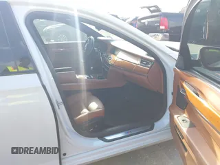 2014 BMW 7 Series ALPINA B7 with VIN WBAYE8C53ED136145, listed as a IAAI auction lot 42057674 with 108,752 mi miles and . Bid and sale history available at DreamBid. Image 5.
