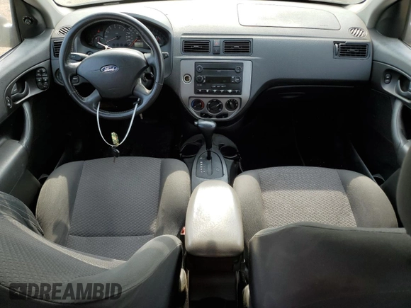 2005 Ford Focus S with VIN 3FAFP37NX5R134987, listed as a Copart auction lot 60478825 with 204,927 mi miles and Clean title. Bid and sale history available at DreamBid. Image 8.