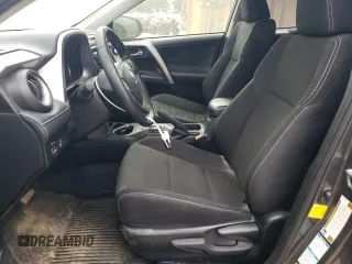 2018 Toyota RAV4 XLE with VIN JTMRFREV5JJ739620, listed as a Copart auction lot 48218185 with 82,885 mi miles and Salvage Title. Bid and sale history available at DreamBid. Image 7.