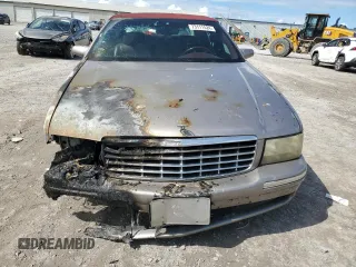 1998 Cadillac DeVille with VIN 1G6KD54Y4WU720710, listed as a Copart auction lot 73111524 with 0 mi miles and Salvage Title. Bid and sale history available at carsss.com. Image 5.