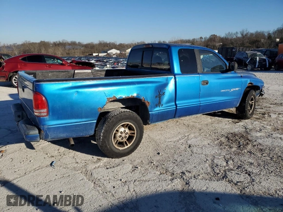 1999 Dodge Dakota SLT with VIN 1B7GL22X5XS321879, listed as a Copart auction lot 84015834 with 210,252 mi miles and Salvage Title. Bid and sale history available at carsss.com. Image 3.