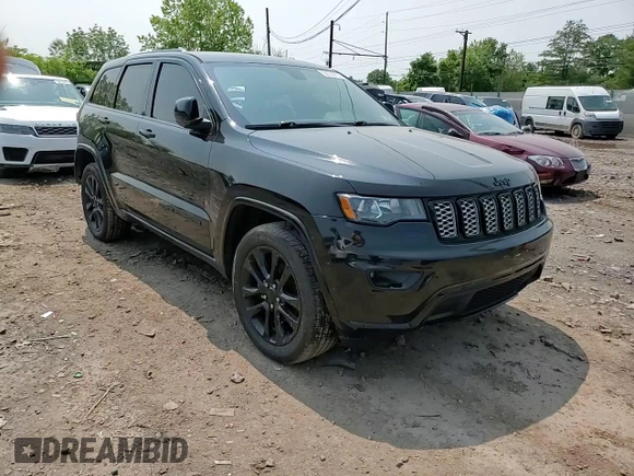 2017 Jeep Grand Cherokee Altitude with VIN 1C4RJFAG5HC892291, listed as a Copart auction lot 58579975 with 71,018 mi miles and Salvage title. Bid and sale history available at DreamBid. Image 14.