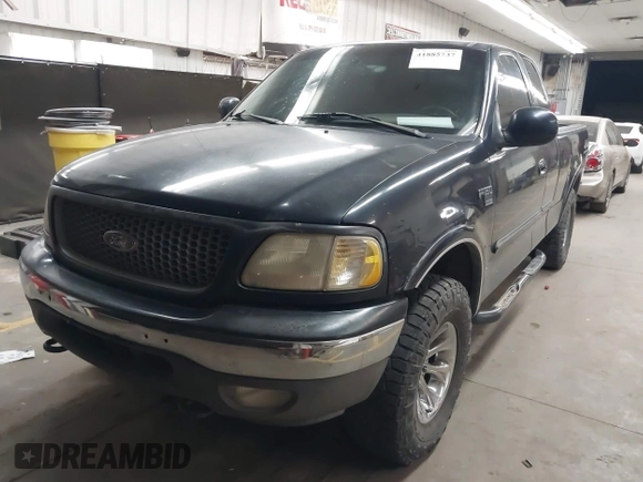 1999 Ford F-150 XL with VIN 1FTRX18L5XKB05347, listed as a IAAI auction lot 41885737 with 250,070 mi miles. Bid and sale history available at carsss.com. Image 2.