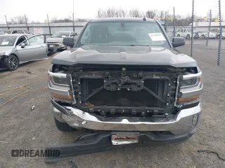 2017 Chevrolet Silverado 1500 LT with VIN 3GCUKREC3HG491481, listed as a IAAI auction lot 41796287 with 59,696 mi miles and . Bid and sale history available at DreamBid. Image 13.