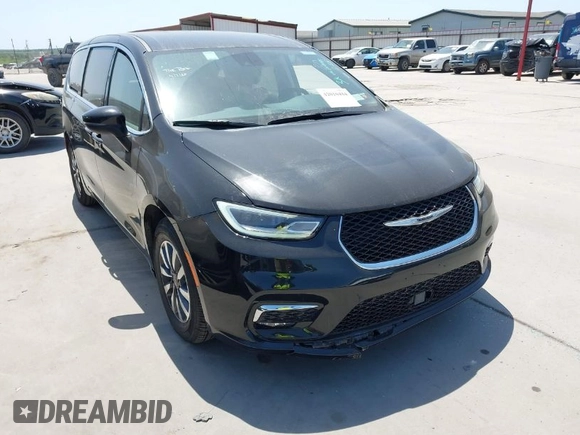 2023 Chrysler Pacifica Hybrid Touring L z VIN 2C4RC1L77PR540958, wystawiony jako IAAI lot #42010484 z przebiegiem 61 166 mil mil oraz . Historia ofert i sprzedaży dostępna na DreamBid. Obrazek 1.
