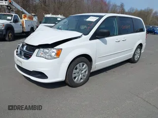 2015 Dodge Grand Caravan SE with VIN 2C4RDGBG6FR613981, listed as a IAAI auction lot 42043348 with 87,615 mi miles and . Bid and sale history available at DreamBid. Image 2.