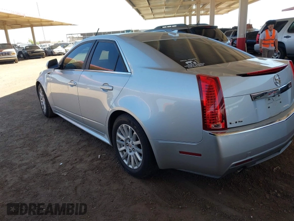 2013 Cadillac CTS Luxury with VIN 1G6DE5E52D0156666, listed as a IAAI auction lot 42058687 with 120,659 mi miles and . Bid and sale history available at DreamBid. Image 3.