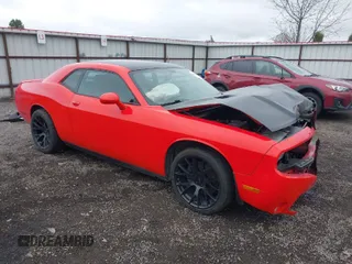 2013 Dodge Challenger R/T with VIN 2C3CDYBT9DH741227, listed as a IAAI auction lot 41932552 with 74,185 mi miles. Bid and sale history available at carsss.com. Image 1.