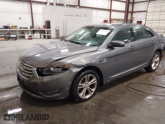 2013 Ford Taurus SEL with VIN 1FAHP2E86DG177504, listed as a IAAI auction lot 42071852 with 130,547 mi miles and . Bid and sale history available at carsss.com. Image 2.