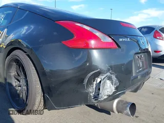 2016 Nissan 370Z with VIN JN1AZ4EH1GM933265, listed as a IAAI auction lot 41831484 with 98,193 mi miles. Bid and sale history available at carsss.com. Image 6.