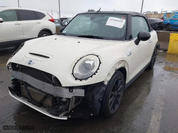 2016 MINI Cooper Convertible S with VIN WMWWG9C52G3C21934, listed as a IAAI auction lot 41569029 with 102,042 mi miles. Bid and sale history available at carsss.com. Image 2.