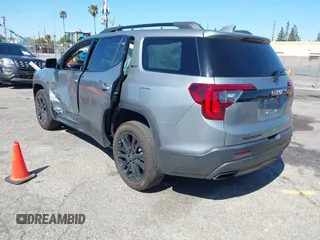 2023 GMC Acadia SLT with VIN 1GKKNML40PZ119581, listed as a IAAI auction lot 41841288 with 23,611 mi miles and . Bid and sale history available at DreamBid. Image 3.