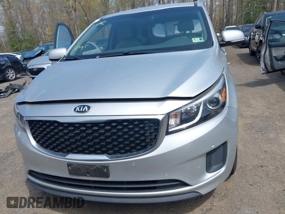 2017 Kia Sedona LX with VIN KNDMB5C17H6292641, listed as a IAAI auction lot 42010175 with 95,247 mi miles. Bid and sale history available at carsss.com. Image 12.