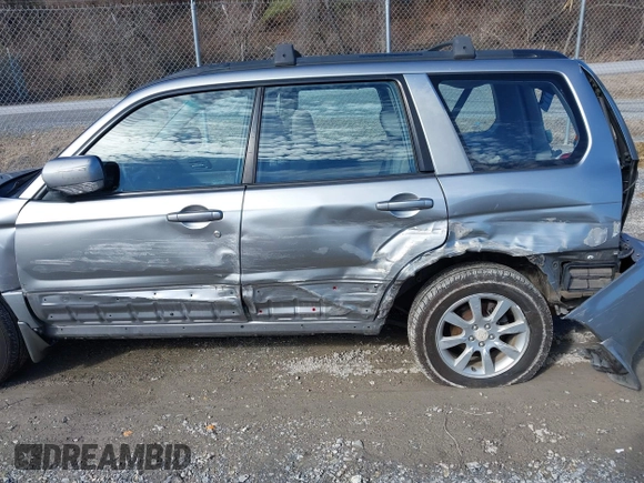2007 Subaru Forester X w/Premium Pkg with VIN JF1SG65647H701713, listed as a IAAI auction lot 41464333 with 184,305 mi miles. Bid and sale history available at carsss.com. Image 6.