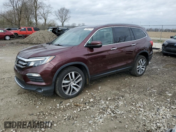 2017 Honda Pilot Touring with VIN 5FNYF6H95HB007885, listed as a Copart auction lot 50945215 with 118,699 mi miles and Clean Title. Bid and sale history available at DreamBid. Image 1.