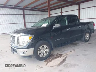2018 Nissan Titan SV with VIN 1N6AA1E63JN512230, listed as a IAAI auction lot 42000705 with 64,479 mi miles and . Bid and sale history available at DreamBid. Image 2.