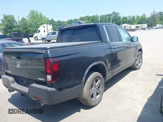 2022 Honda Ridgeline RTL-E with VIN 5FPYK3F75NB020232, listed as a IAAI auction lot 42549034 with 40,209 mi miles and . Bid and sale history available at DreamBid. Image 4.
