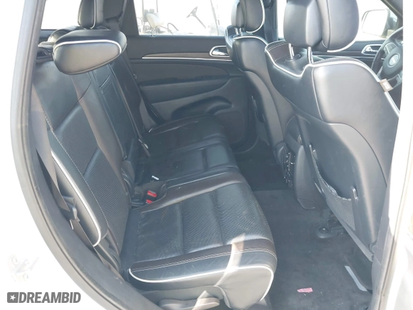 2014 Jeep Grand Cherokee Overland with VIN 1C4RJFCG6EC579985, listed as a IAAI auction lot 42025215 with 126,761 mi miles. Bid and sale history available at carsss.com. Image 8.
