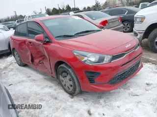 2023 Kia Rio S z VIN 3KPA24ADXPE607810, wystawiony jako IAAI lot #41628192 z przebiegiem 38 872 mil mil oraz . Historia ofert i sprzedaży dostępna na DreamBid. Obrazek 1.