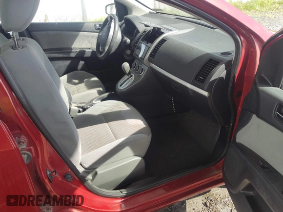2012 Nissan Sentra 2.0 z VIN 3N1AB6AP9CL713129, wystawiony jako IAAI lot #42309760 z przebiegiem 143 699 mil mil oraz . Historia ofert i sprzedaży dostępna na DreamBid. Obrazek 5.