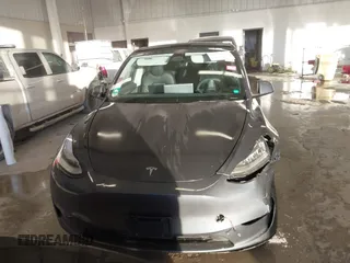 2023 Tesla Model Y Long Range with VIN 7SAYGDEE5PA033341, listed as a IAAI auction lot 41379625 with Not provided miles and . Bid and sale history available at DreamBid. Image 12.