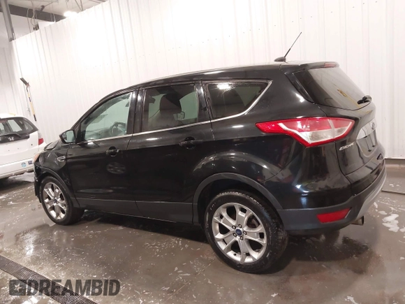 2013 Ford Escape SEL with VIN 1FMCU9H99DUD11347, listed as a IAAI auction lot 41758824 with 154,339 mi miles. Bid and sale history available at carsss.com. Image 14.