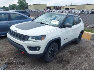 2019 Jeep Compass Trailhawk z VIN 3C4NJDDB3KT760631, wystawiony jako IAAI lot #42681139 z przebiegiem 71 128 mil mil oraz . Historia ofert i sprzedaży dostępna na DreamBid. Obrazek 17.