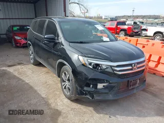 2017 Honda Pilot EX-L with VIN 5FNYF5H5XHB005735, listed as a IAAI auction lot 41791678 with 131,480 mi miles. Bid and sale history available at carsss.com. Image 1.