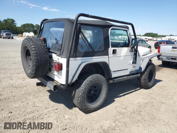 2003 Jeep Wrangler X with VIN 1J4FA39S13P311214, listed as a Copart auction lot 57345175 with 75,088 mi miles and Salvage title. Bid and sale history available at DreamBid. Image 3.