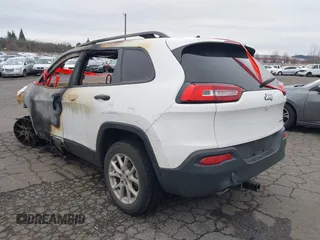 2016 Jeep Cherokee Altitude with VIN 1C4PJLAB7GW324163, listed as a IAAI auction lot 41605604 with 132,450 mi miles. Bid and sale history available at carsss.com. Image 3.