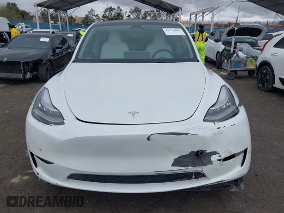 2023 Tesla Model Y Long Range with VIN 7SAYGDEE1PA106057, listed as a IAAI auction lot 41778642 with 1 mi miles. Bid and sale history available at carsss.com. Image 13.
