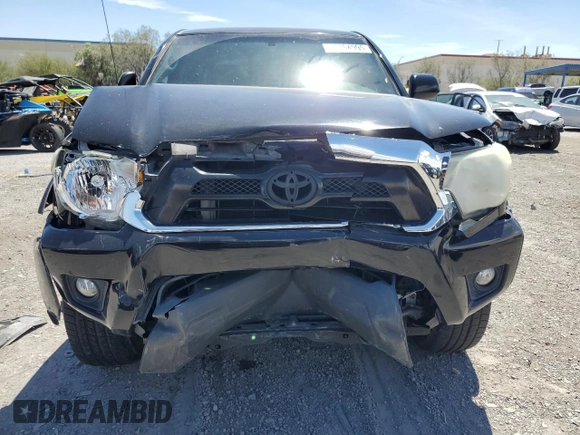 2015 Toyota Tacoma PreRunner with VIN 5TFJU4GN1FX074660, listed as a Copart auction lot 57364995 with 169,185 mi miles and Salvage title. Bid and sale history available at DreamBid. Image 5.