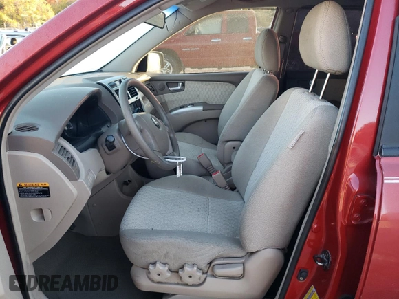 2005 Kia Sportage LX with VIN KNDJE723X57054667, listed as a Copart auction lot 77134794 with 159,748 mi miles and Salvage Title. Bid and sale history available at carsss.com. Image 7.